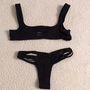 Black revealing bathing suit